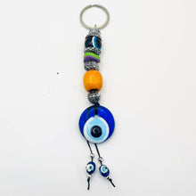 Load image into Gallery viewer, Handmade Wooden Stones Evil Eye Keychain
