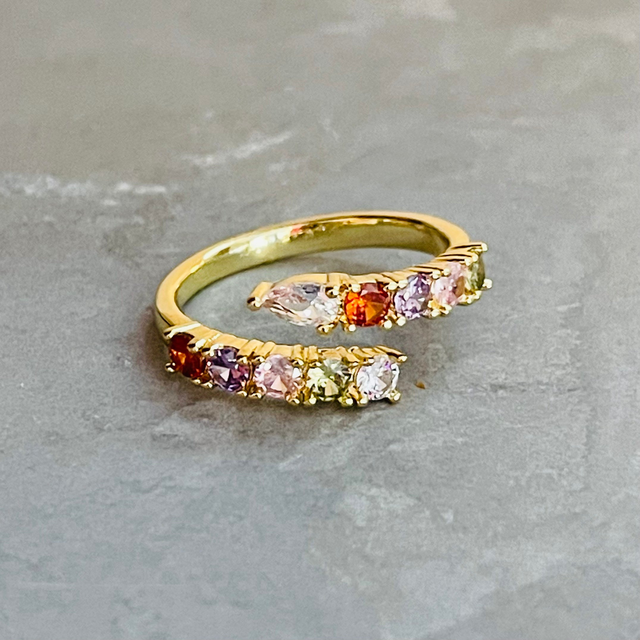 The Colorful Sparkling Gemstone Adjustable Ring is a vibrant