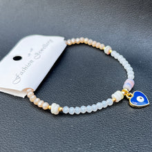 Load image into Gallery viewer, Crystal Bracelet | Heart Evil Eye Charm | 9 Color Options 
