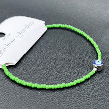 Load image into Gallery viewer, Crystal Bracelet | Beaded Evil Eye Charm | 7 Color Options 
