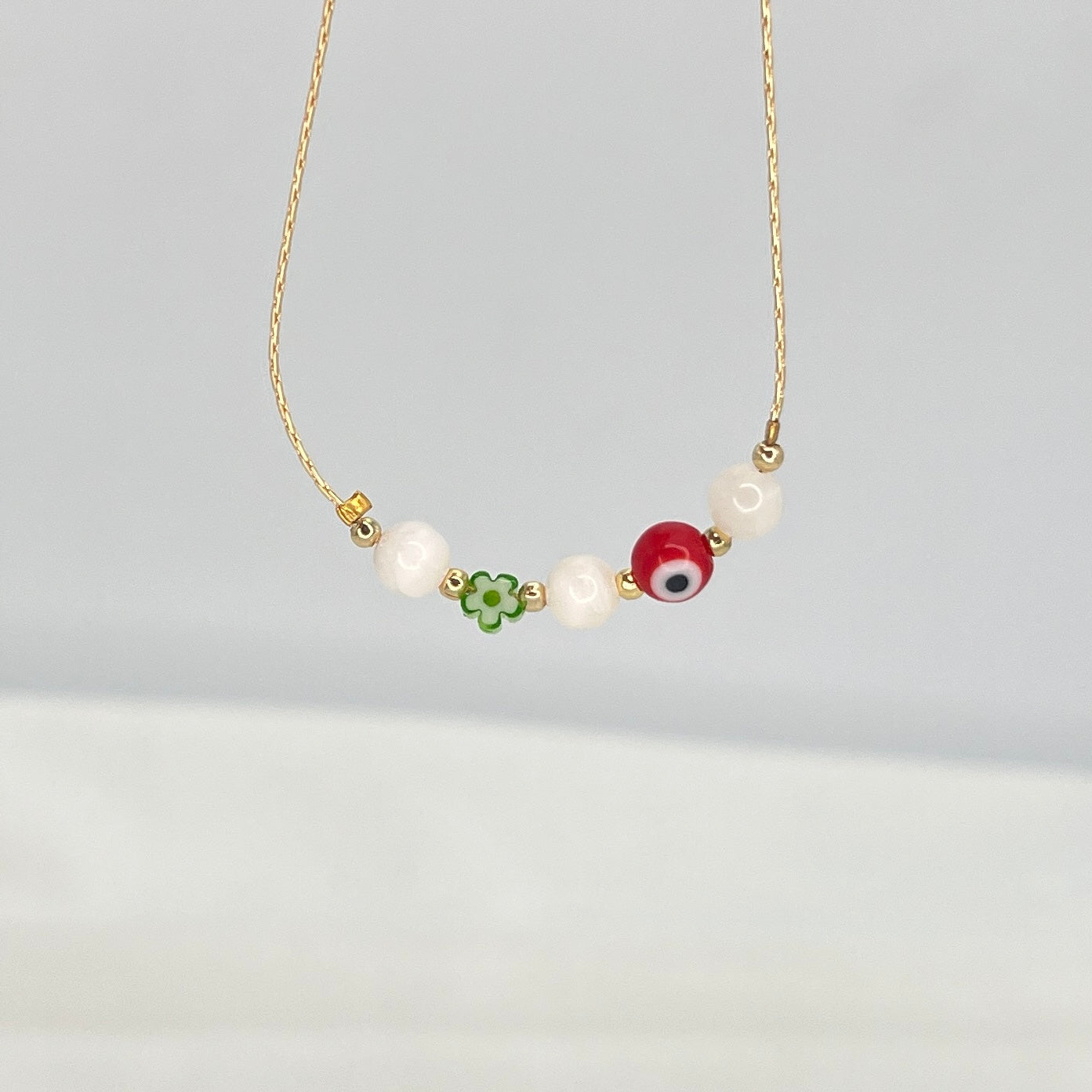 Lux White Beaded Stone Red Evil Eye Bracelet – Protective