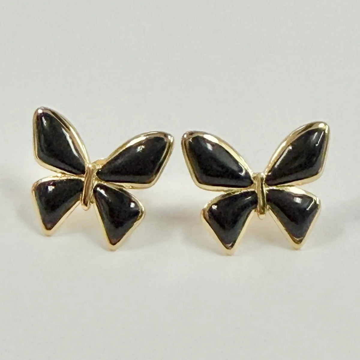 Stainless Steel Gold Black Enamel Bow Stud Earrings